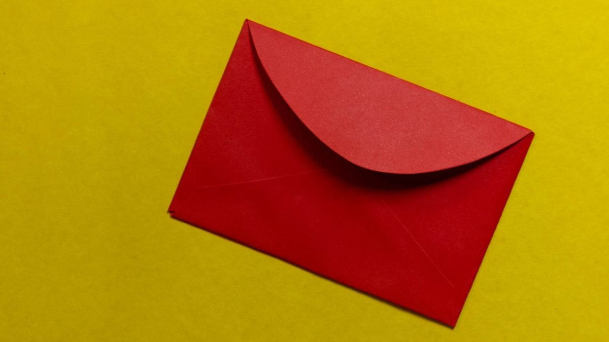 red paper on yellow surface