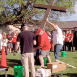 Memorial cross raised for victims of afterschool program tragedy